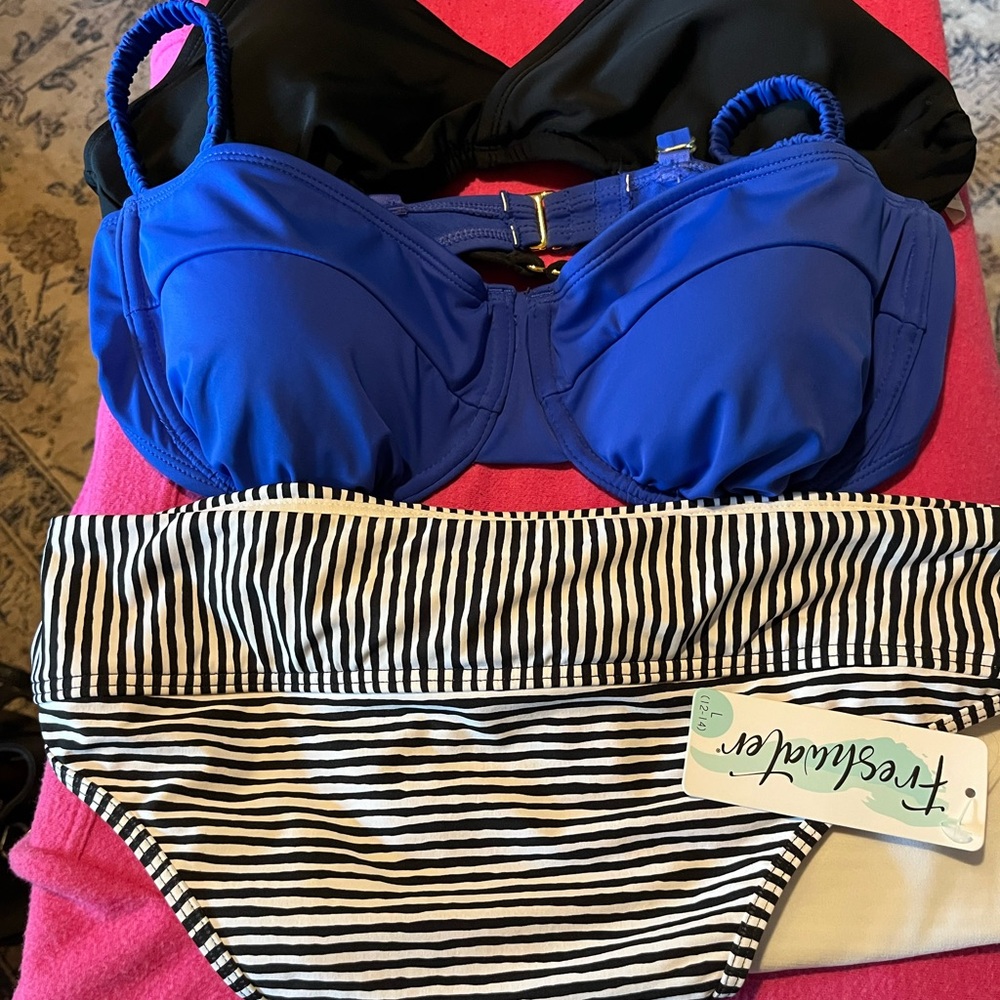 Black and White Striped Bikini Set
Two tops brand new one black one blue